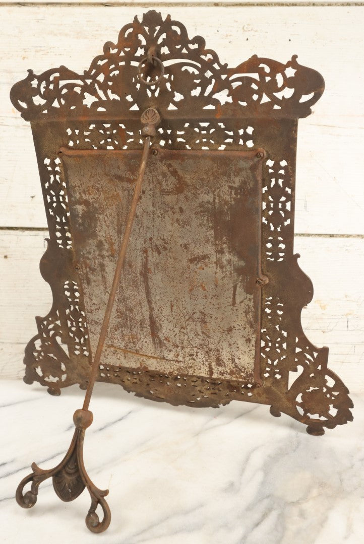 Lot 090 - Antique Ornate Cast Metal Mirror Frame With Beveled Mirror, Kick Stand, Unknown Maker, Note Wear And Crazing To Mirror