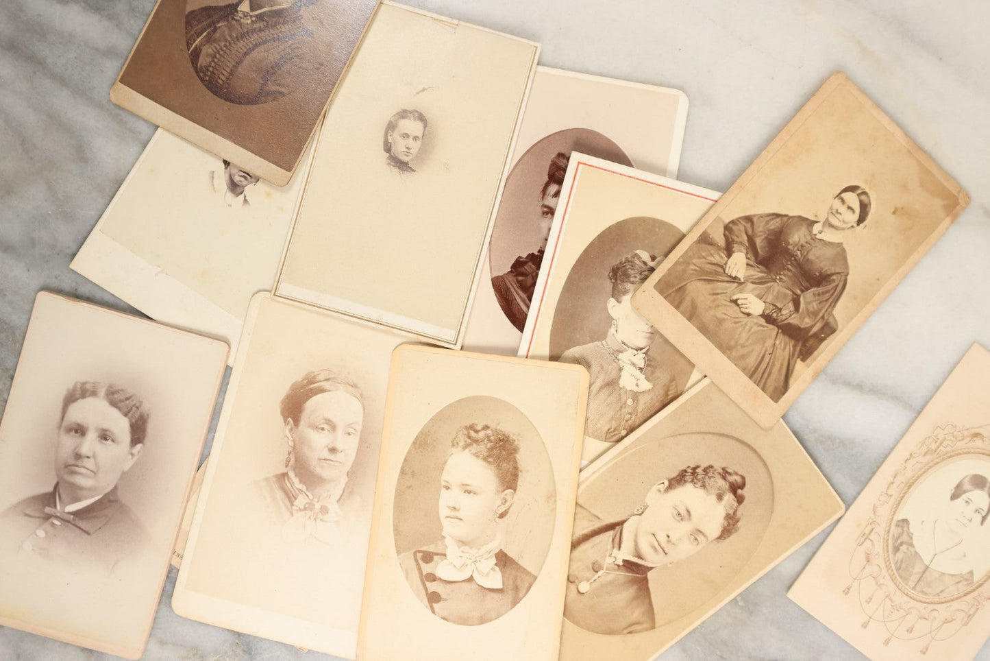 Lot 138 - Grouping Of 35+ Antique Carte De Visite C.D.V. Photographs Of Women And Girls, Including Many With Extravagant Books And Dress, Women Holding Book, Interesting Hairstyles, And More