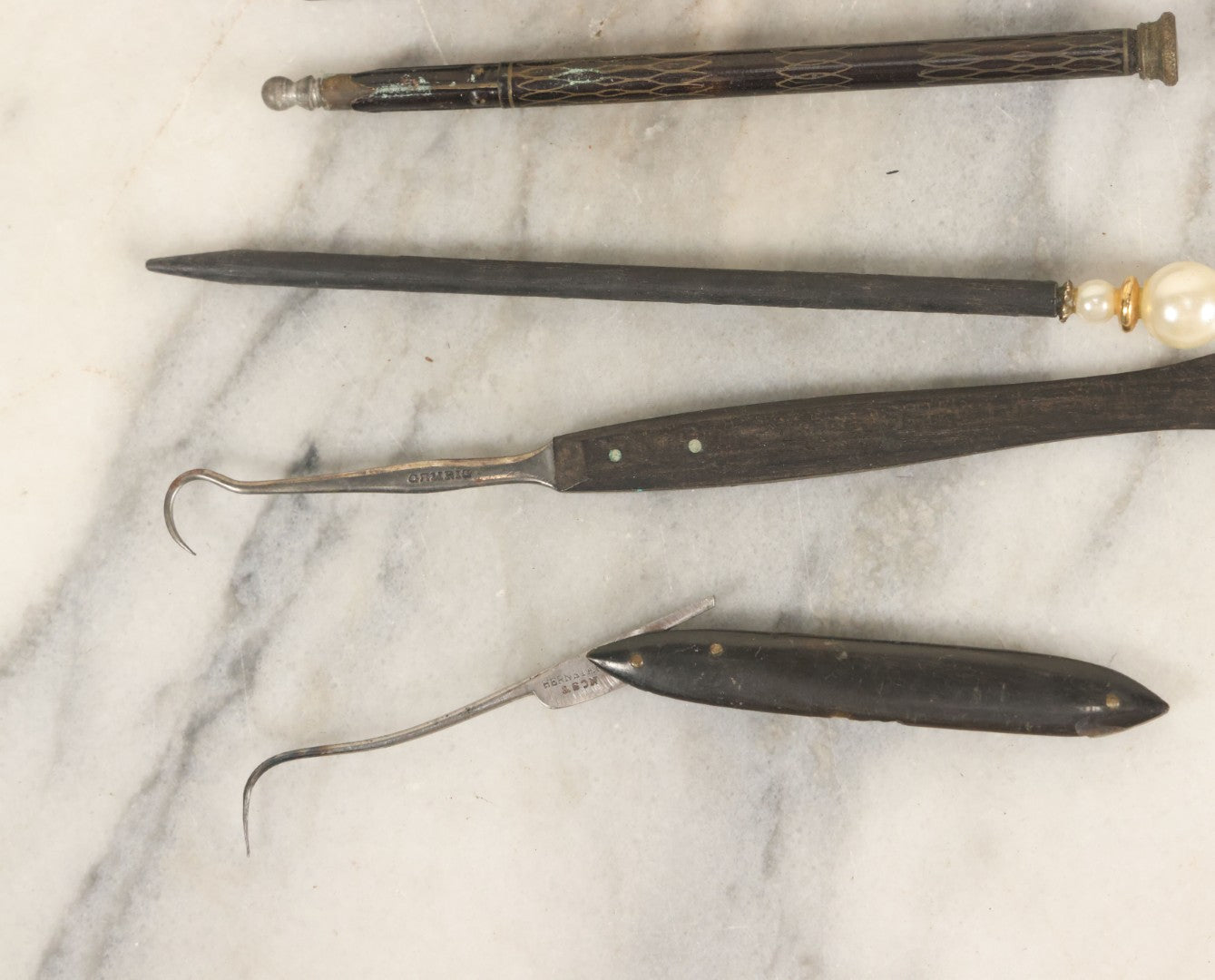 Lot 142 - Junk Drawer Lot, Grouping Of Six Plus Implements Including Antique Pens And Nibs, Hooks, And More, As Found