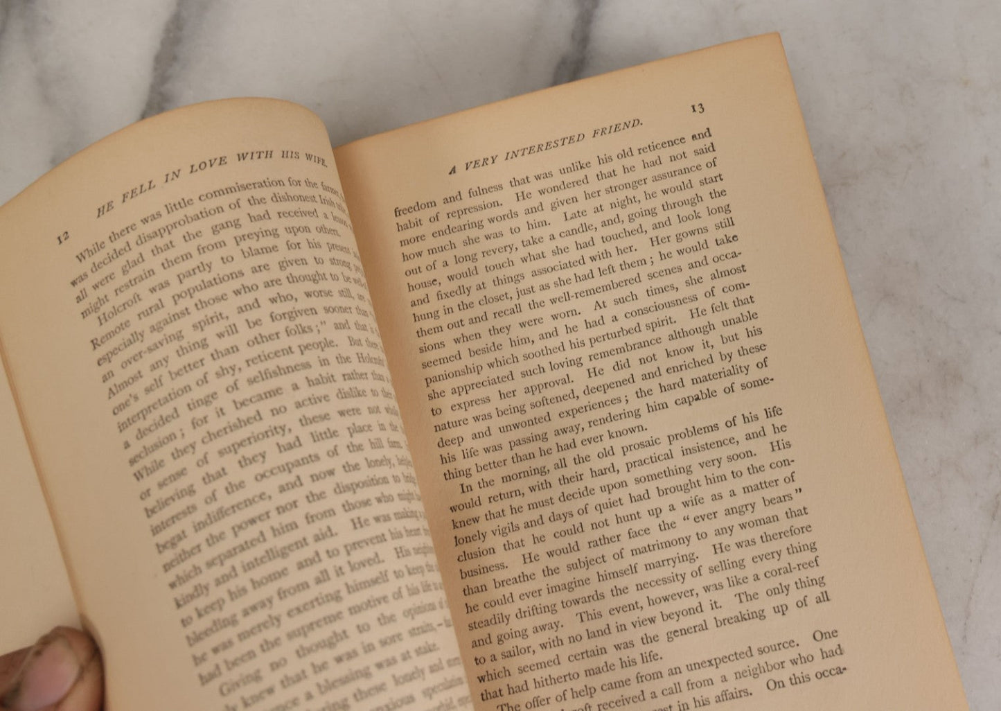 Lot 110 - "He Fell In Love With His Wife" Antique Romance Novel By Edward P. Roe, With Cover Art Of Woman Playing With Fluffy White Cat, Illustrated By Z.P. Nikolaki, Grosset & Dunlap, Publishers, New York, Copyright 1911, By Dodd, Mead & Co.