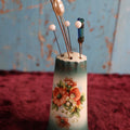 Lot 073 - Grouping Of Approximately 8 Vintage To Antique Hair Pins With Porcelain Hair Pin Holder