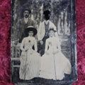 Lot 100 - Titnype Of Four People, Man's Face Scratched Out