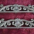 Lot 069 - Pair Of Antique Cast Metal Ornamental Hardware Pieces