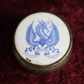 Lot 035 - Antique Advertising Tin Pot With Enamel Plaque Of Winged Dragon, "Enamel Advertising Novelties," By O'Hara Waltham Opal Co., Waltham, Massachusetts