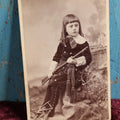 Lot 093 - Antique Midwestern Cabinet Card Photo Of Young Girl Holding Rifle, Photographed By Shelton Portrairs, St Louis, Missouri