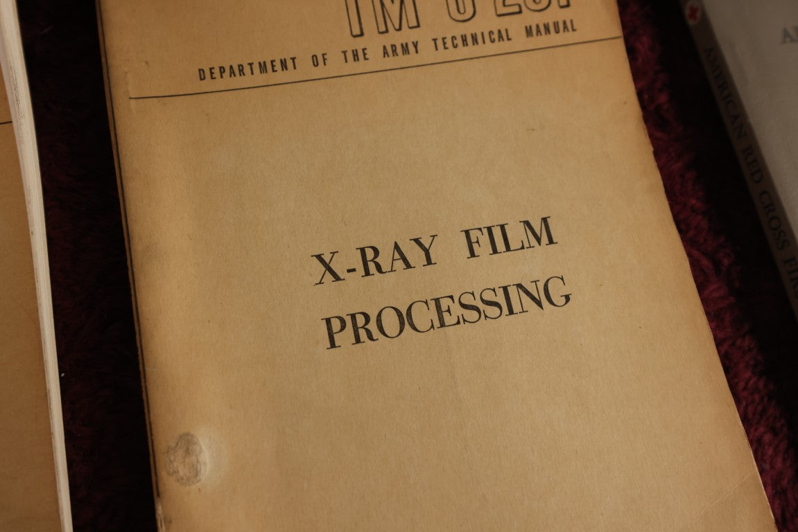 Lot 144 - Three Piece Medical Ephemera Grouping - Principles Of Radiographic Exposure, X-Ray Film Processing, And The American Red Cross First Aid Text Book