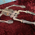 Lot 035 - Vintage Jointed Skeleton Paper / Cardboard Halloween Decoration, Circa 1990s