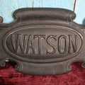 Lot 071 - Antique Carved Wood Black Painted Family Name Plaque, "Watson," Originally Mounted Flat To Something, About 16" x 11"