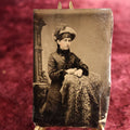 Lot 101 - Tintype - Woman Leaning On Pedestal Covered In Paisley, In Large Fuzzy Hat
