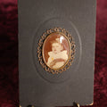 Lot 139 - Small Photo Button In Metal Frame Mounted To Board With Kickstand, Small Baby With Blonde Curly Hair, Identified As Aunt Zena