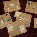 Lot 154 - Grouping Of Five Plus Pages From Photo Scrapbook Of Young Children With Pencil Writing, Small Illustrations, Including Dog's Grave, Photos Of Twins, Early 20th Century