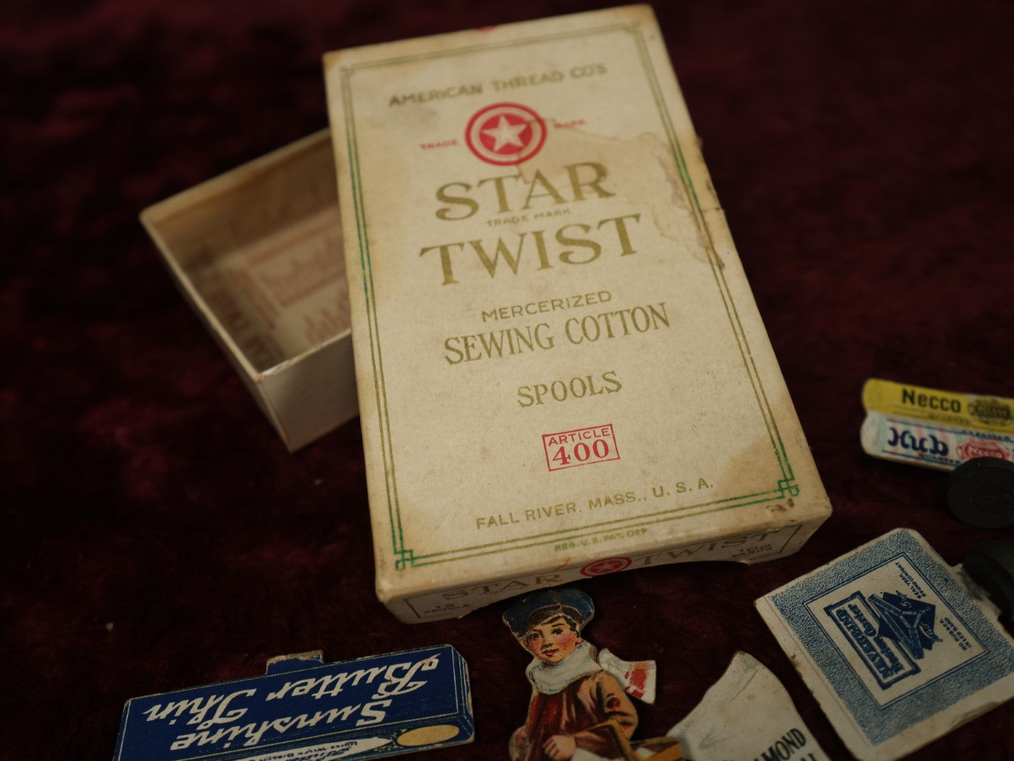 Lot 166 - Grouping Of Advertising Game Pieces In Star Twist Sewing Cotton Box