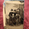 Lot 123 - Single Tintype Photo, Group Of Four Women And A Man, Painted Backdrop With Edges Of Backdrop Visible