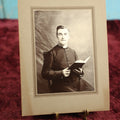 Lot 139 - Single Antique Boarded Photograph Of A Priest Holding A Bible, Joyce Photographer, Housatonic, Massachusetts