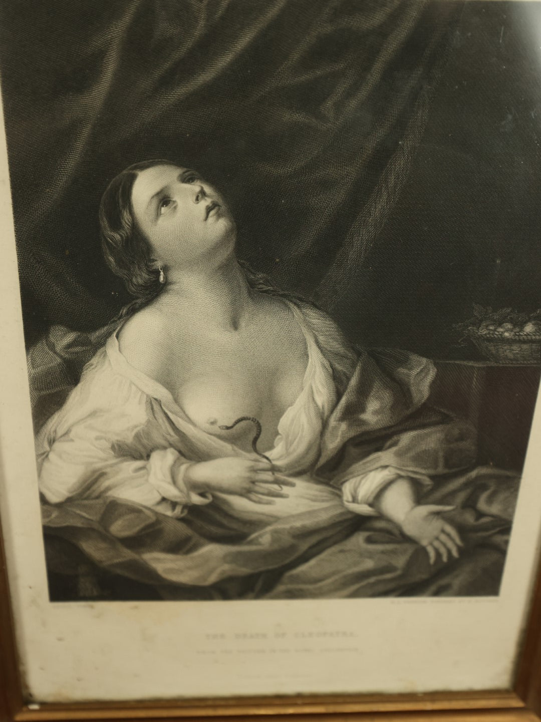 Lot 012 - Antique Engraving, Cleopatra With The Asp, The Suicide And Death Of Cleopatra Holding A Snake To Her Breast, After Guido Reni (Italian, 1575-1642), Framed, Engraved By H.C. Shenton, Finished By H. Bourne, Published In London By James S. Virtue