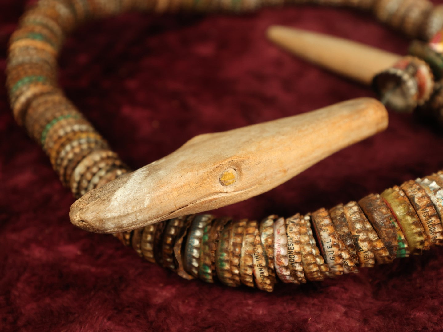 Lot 016 - Vintage Folk Art Bottlecap Snake With Carved Head And Tail, Many Bottle Caps Strung On Wire