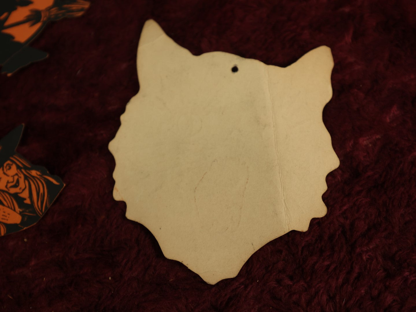 Lot 025 - Grouping Of Eight Plus Vintage Halloween Paper Cutouts Including Witches, Pumpkin, And Cat Face, With Extra Scraps