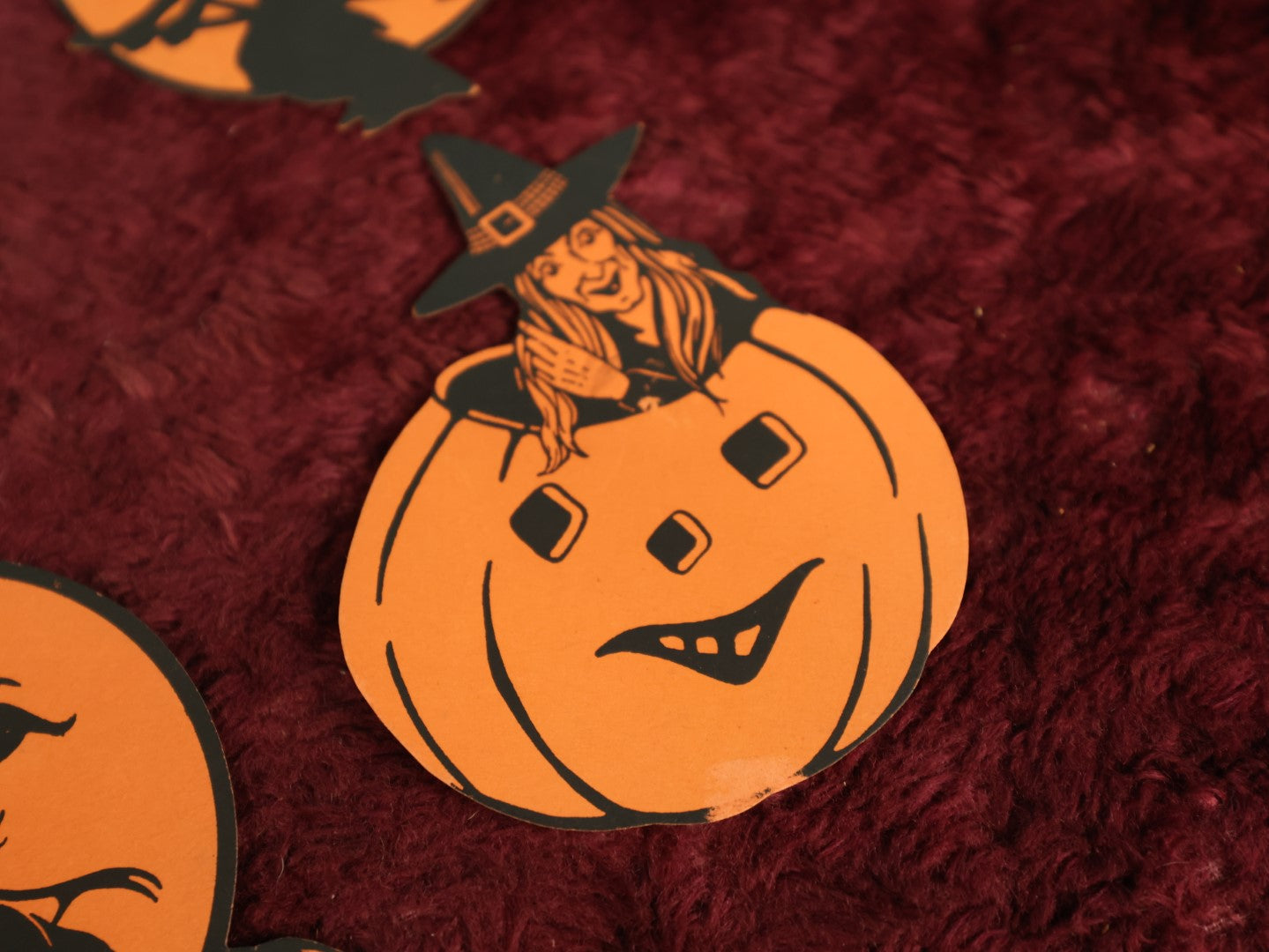 Lot 025 - Grouping Of Eight Plus Vintage Halloween Paper Cutouts Including Witches, Pumpkin, And Cat Face, With Extra Scraps