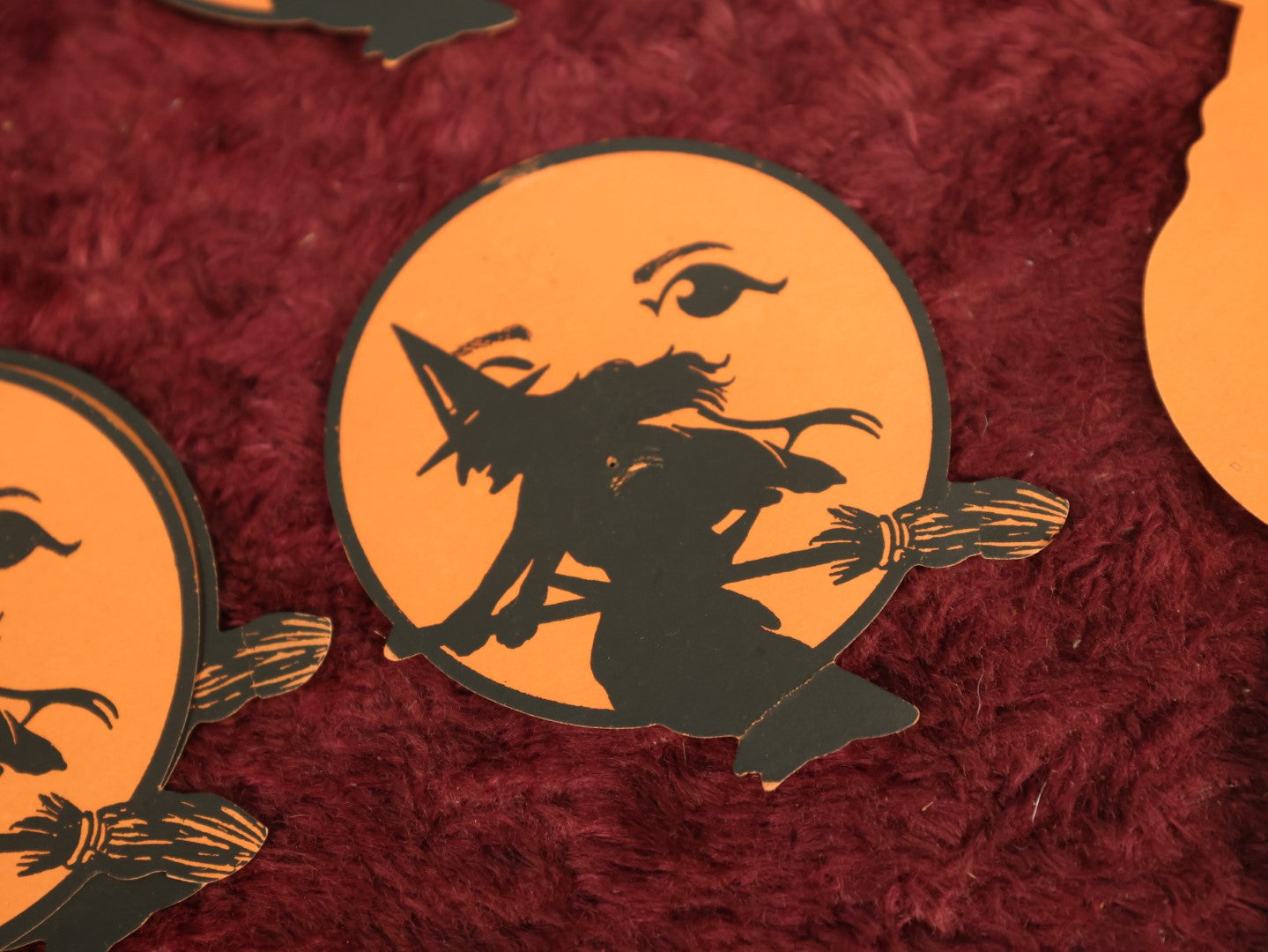 Lot 025 - Grouping Of Eight Plus Vintage Halloween Paper Cutouts Including Witches, Pumpkin, And Cat Face, With Extra Scraps