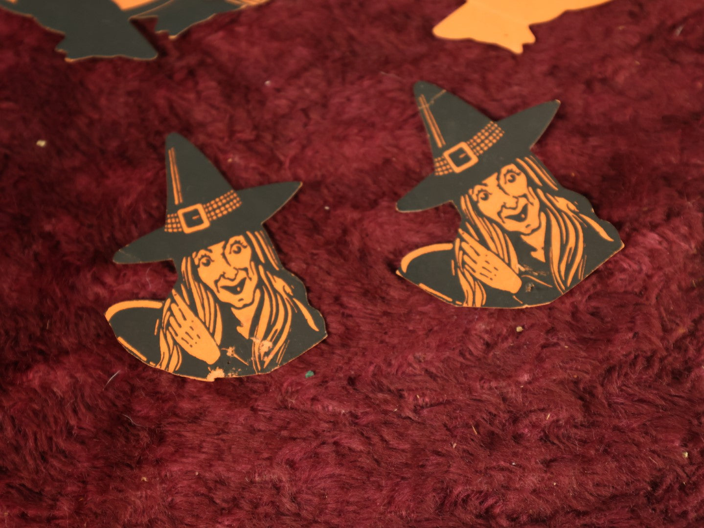 Lot 025 - Grouping Of Eight Plus Vintage Halloween Paper Cutouts Including Witches, Pumpkin, And Cat Face, With Extra Scraps