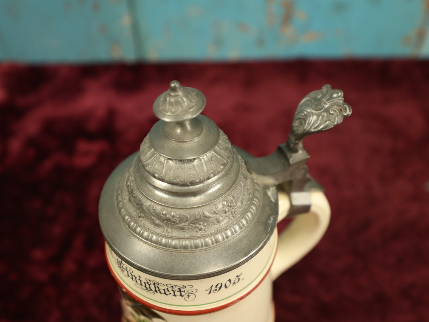 Lot 027 - Antique 1905 German Stein Having To Do With A Social Club, Featuring Winged Bat-Like Woman, Face Impaled Through Eye Ball, Augsburg Coat Of Arms, Signed Jos. (Joseph) Weber, Augsburg, With Markings