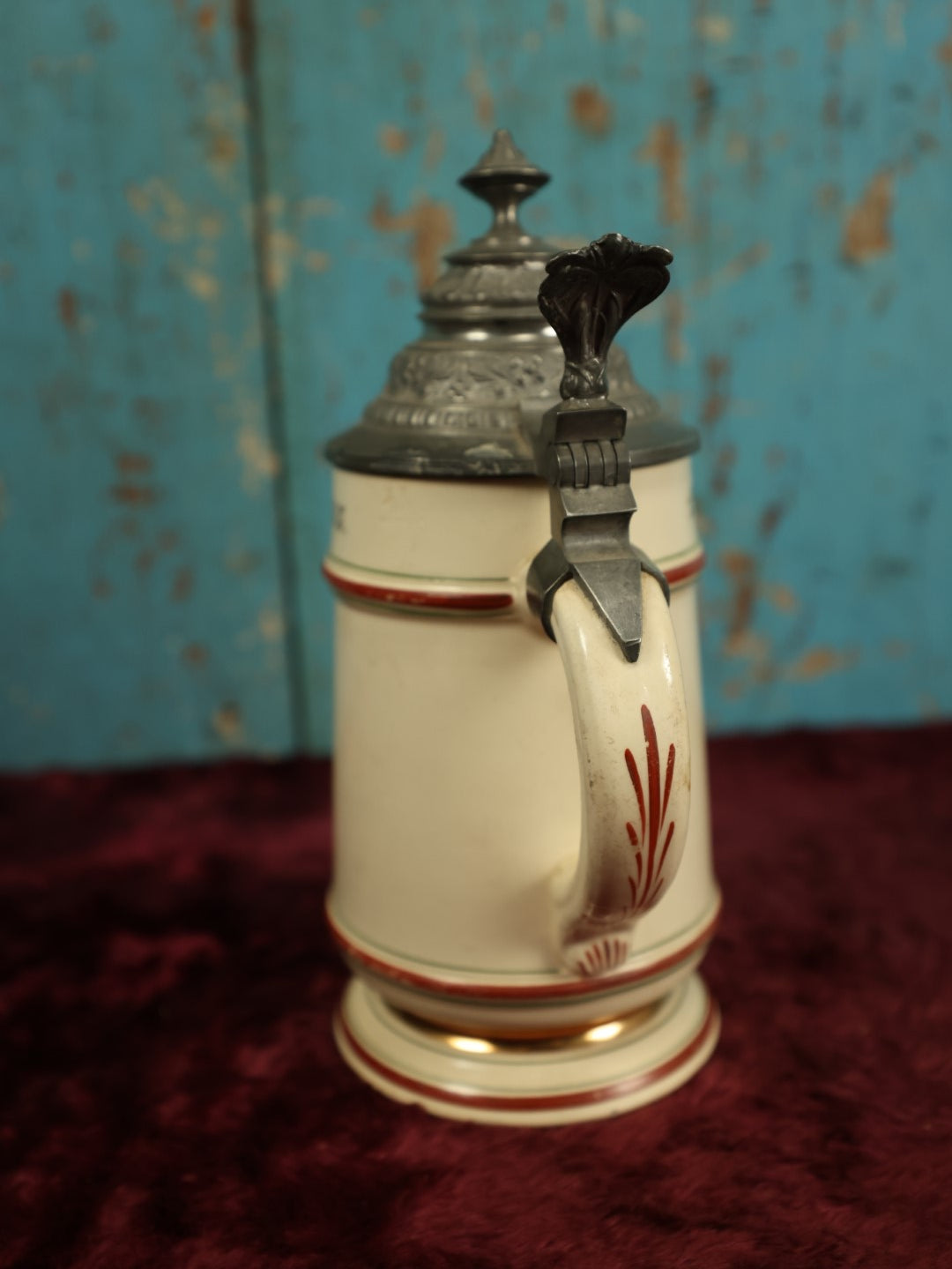 Lot 027 - Antique 1905 German Stein Having To Do With A Social Club, Featuring Winged Bat-Like Woman, Face Impaled Through Eye Ball, Augsburg Coat Of Arms, Signed Jos. (Joseph) Weber, Augsburg, With Markings