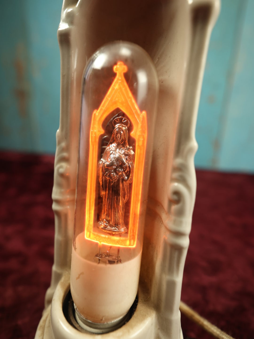 Lot 028 - Antique Auerolux Neon Filament Lightbulb With The Virgin Mary In Porcelain Light Fixture, Fabric Cord, Working Condition