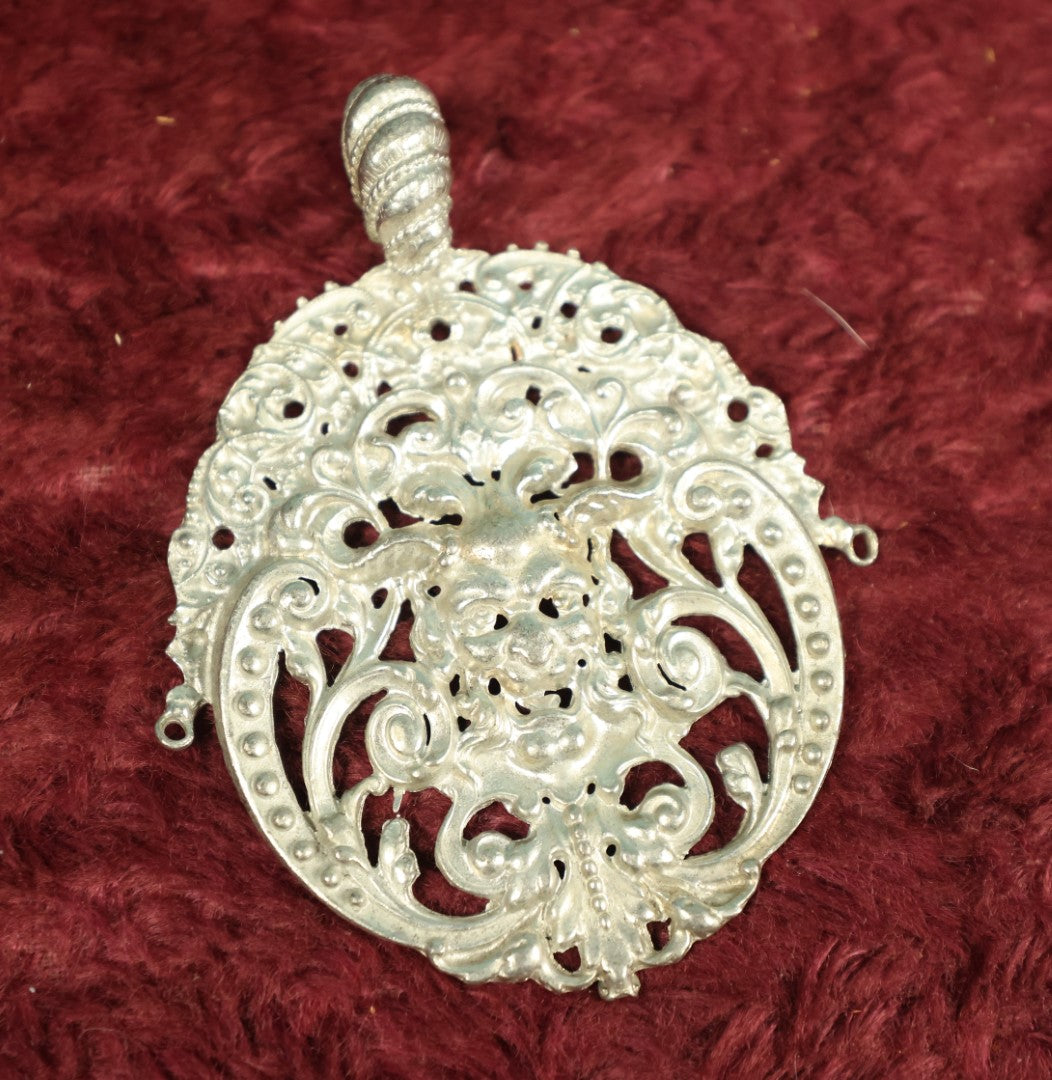 Lot 031 - Vintage Ornate Cast Metal Medallion With Demon Face, Bacchus, Jewelry Fragment