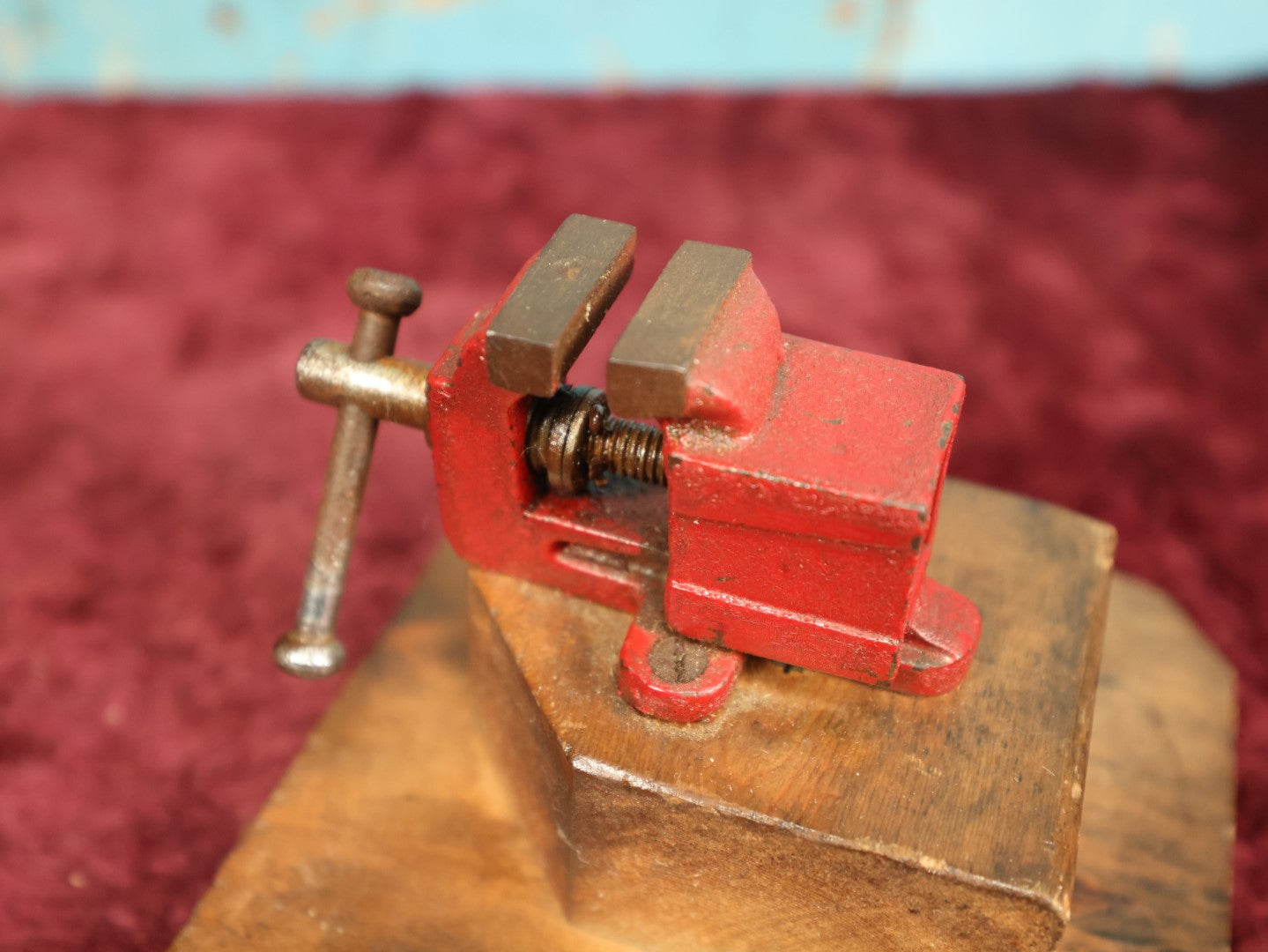 Lot 040 - Vintage Jeweler's Vice With Red Paint, Mounted On Two Tier Wood Block Stand
