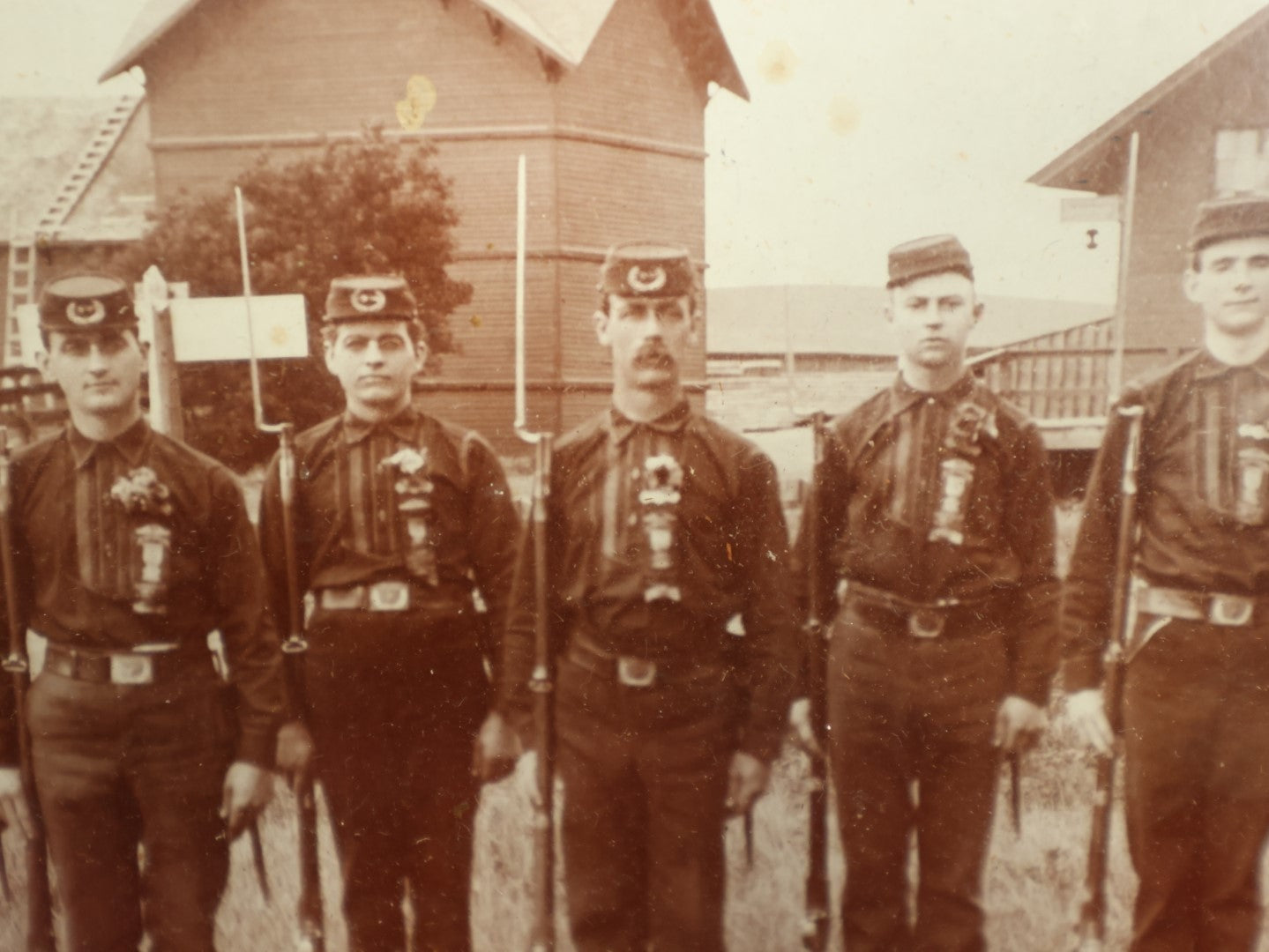 Lot 054 - Antique Framed Boarded Photo Of Soldiers With Various Ribbons, Flag, Etc., Possibly Nebraska Volunteers Or Militia, As Written On Back Of Frame
