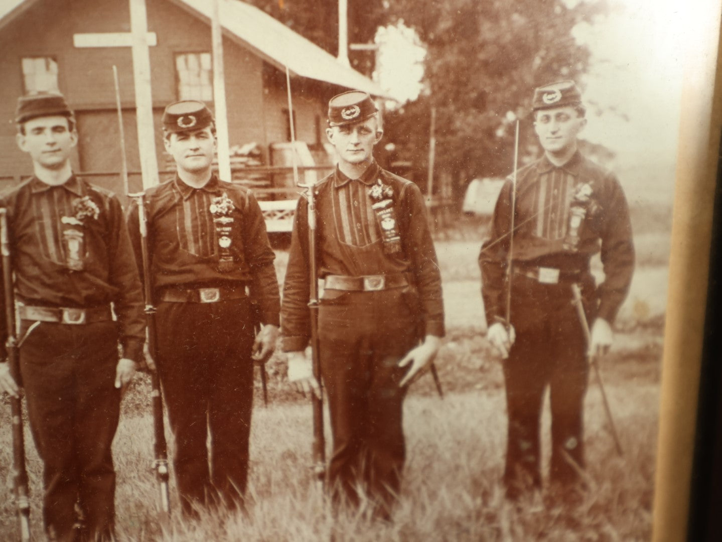 Lot 054 - Antique Framed Boarded Photo Of Soldiers With Various Ribbons, Flag, Etc., Possibly Nebraska Volunteers Or Militia, As Written On Back Of Frame