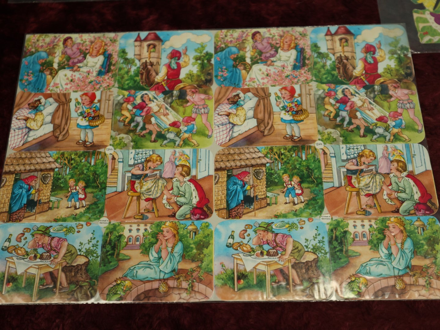 Lot 058 - Grouping Of Four Uncut Die Cut Scrapbooking Paper Sheets, Depicting Various Fairy Tales Including Snow White And More, Printed In Germany