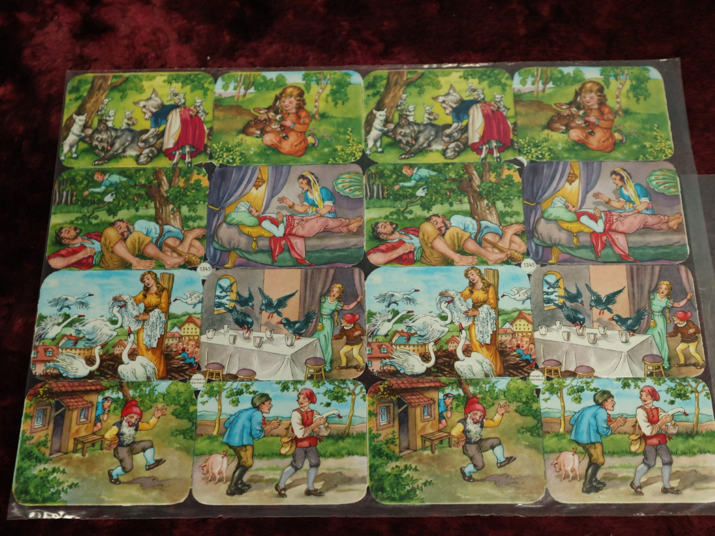 Lot 058 - Grouping Of Four Uncut Die Cut Scrapbooking Paper Sheets, Depicting Various Fairy Tales Including Snow White And More, Printed In Germany