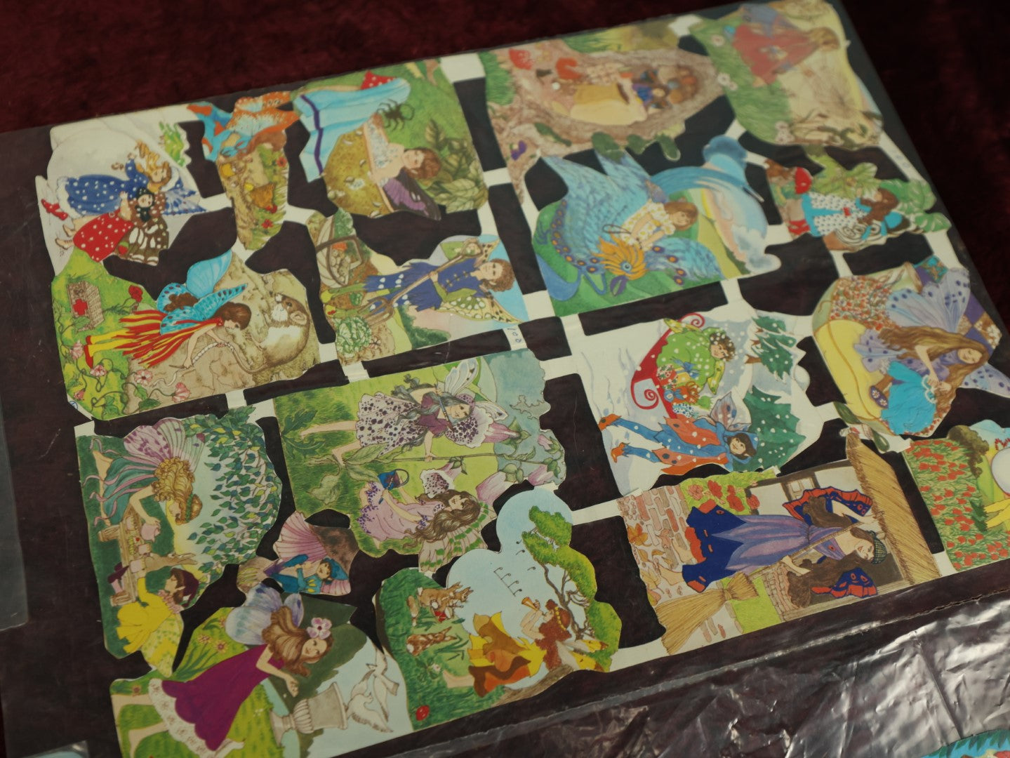 Lot 058 - Grouping Of Four Uncut Die Cut Scrapbooking Paper Sheets, Depicting Various Fairy Tales Including Snow White And More, Printed In Germany