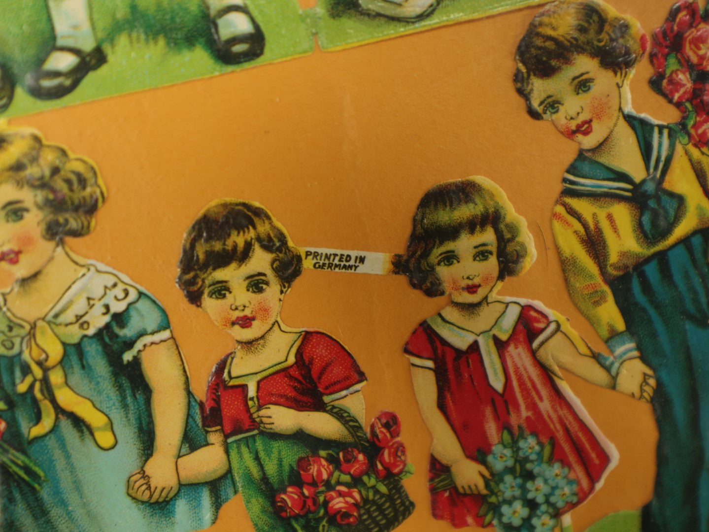 Lot 060 - Grouping Of Three Uncut Die Cut Scrapbooking Paper Sheets, Two Depicting Children, One Of Elegantly Dressed Women, Printed In Germany