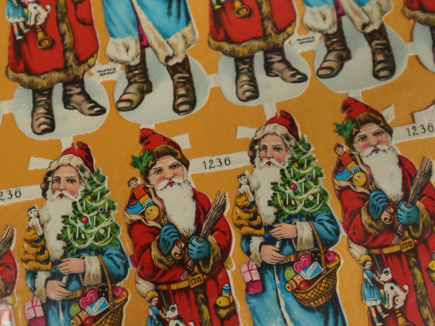 Lot 061 - Single Uncut Die Cut Scrapbooking Sheet With Santa Claus In Red And Blue, Holding Toys, Marked 1230, Made In Germany, Christmas