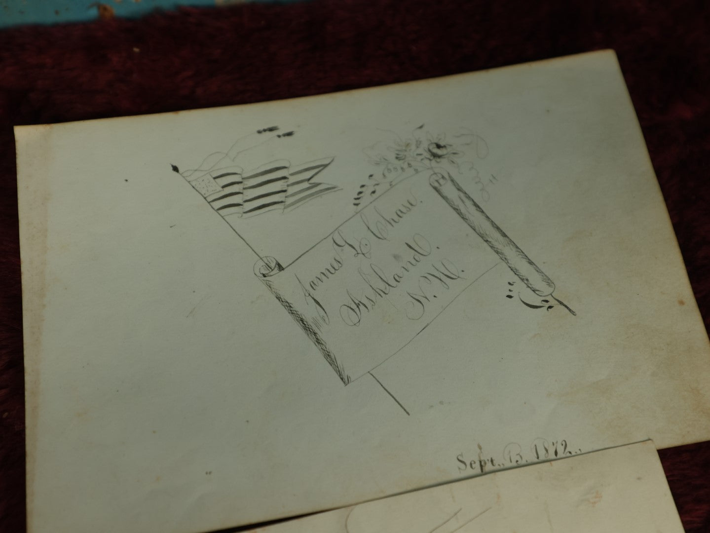 Lot 071 - Grouping Of Three Original Pen And Ink Sketches, 1972 Depiction Of The American Flag From Ashland, New Hampshire, Anthropomorphic Apples Leaving Apple Pie, And Other Apple Related One, Dated 1879