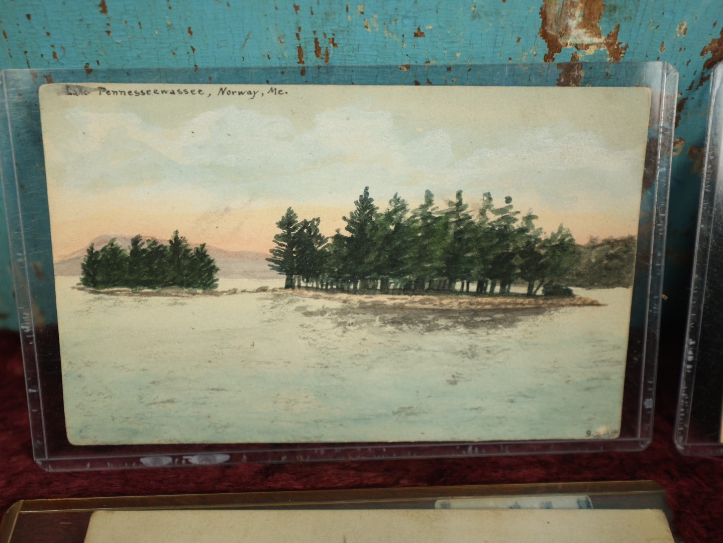 Lot 073 - Grouping Of Four Hand Painted Postcards And Scraps, North Wilmot Church, 1935 Signed E.M.A., Lake Pennesseewassee, Norway, Maine, Red Robins, And Happy New Year Winter Scene  
