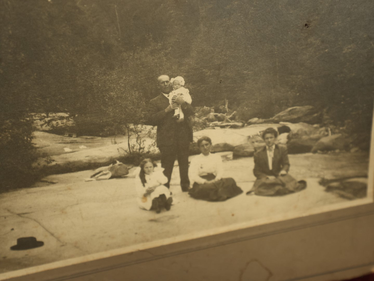 Lot 096 - Grouping Of Seven Boarded Photos Of Outdoor Scenes And Buildings, Homes, Including Family At River, Gardens, Mansion, And More
