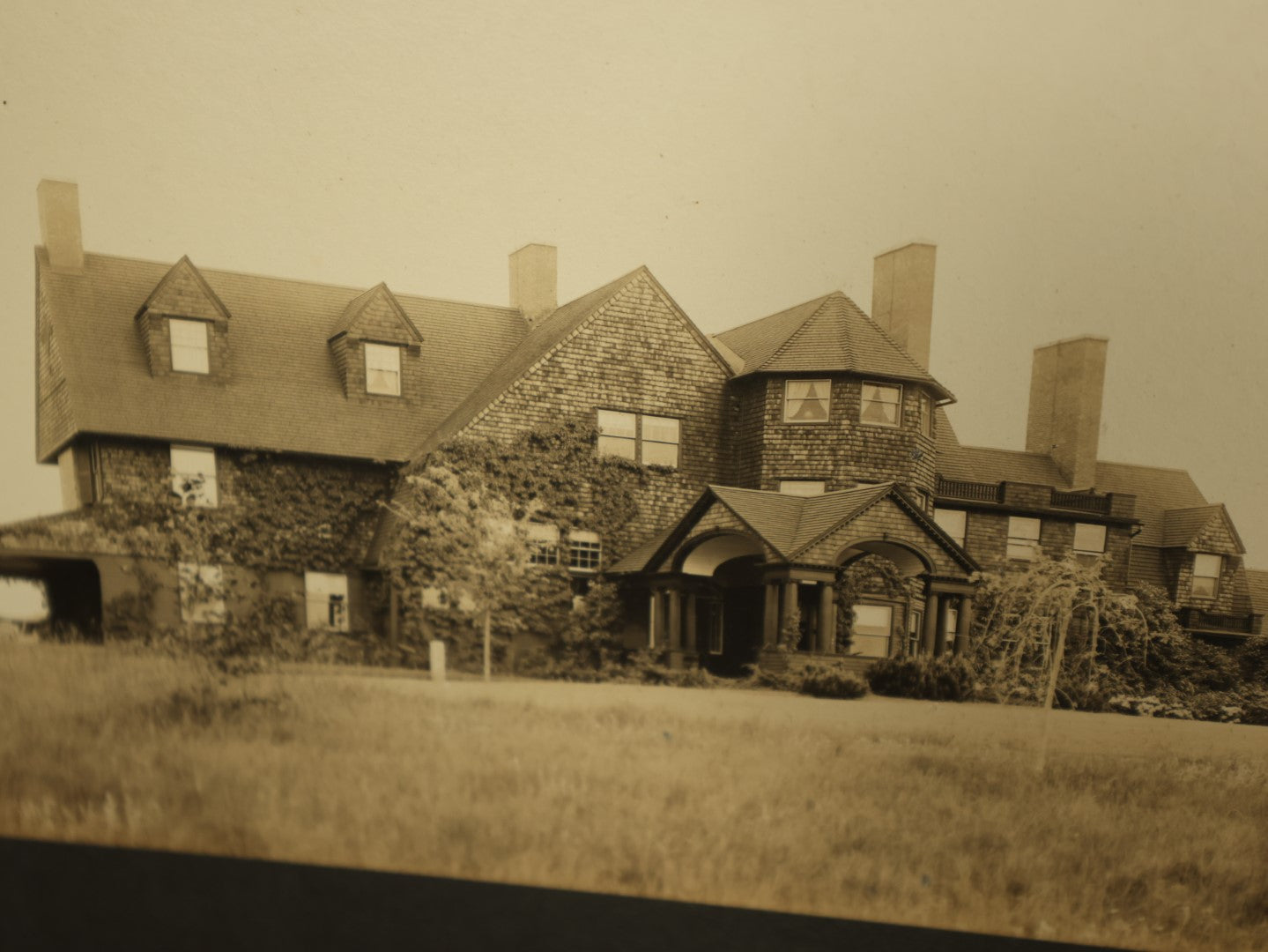 Lot 096 - Grouping Of Seven Boarded Photos Of Outdoor Scenes And Buildings, Homes, Including Family At River, Gardens, Mansion, And More