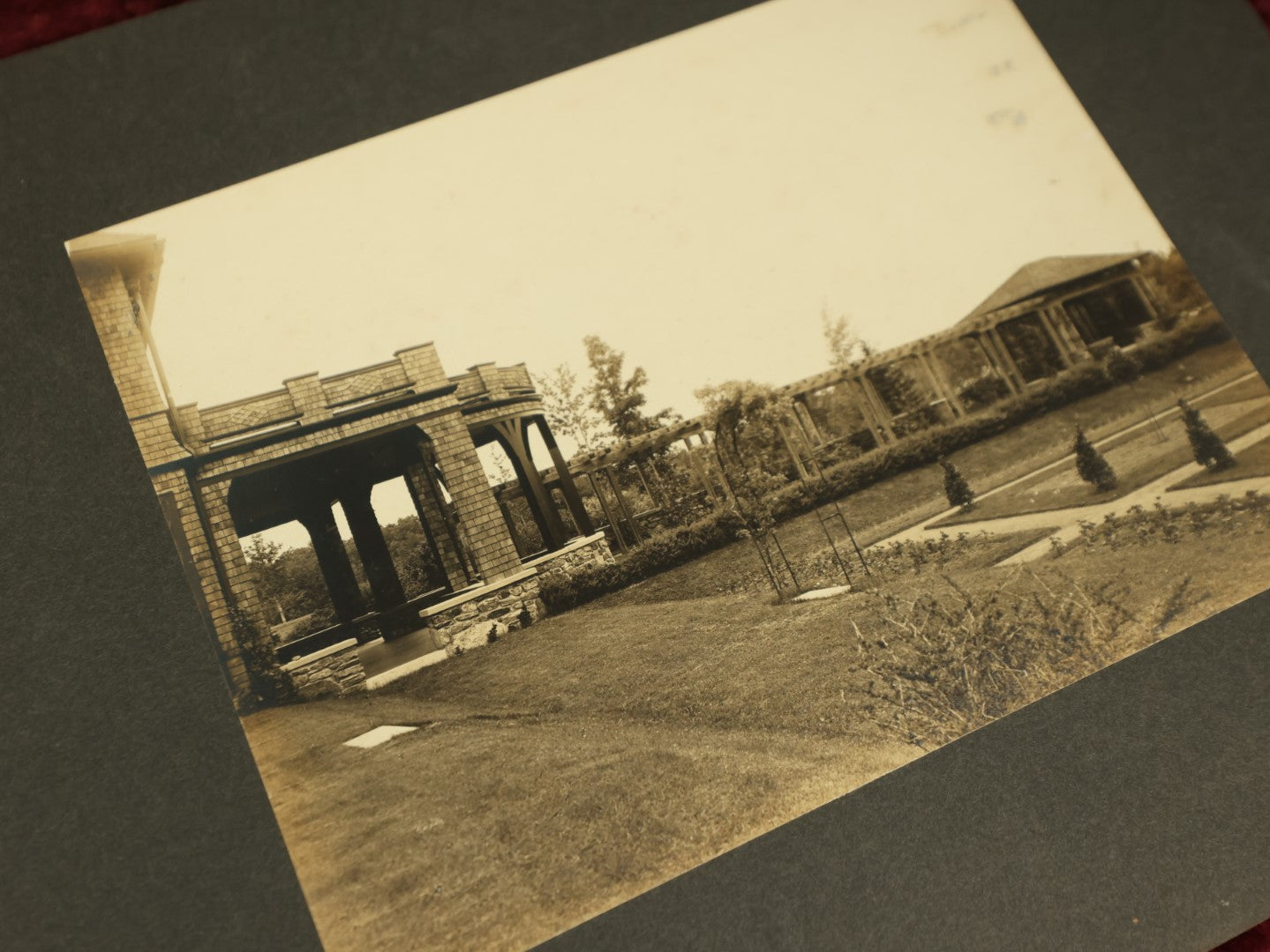Lot 096 - Grouping Of Seven Boarded Photos Of Outdoor Scenes And Buildings, Homes, Including Family At River, Gardens, Mansion, And More