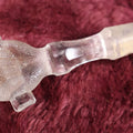 Lot 031 - Antique Fist Clenching Bar Bottle Stopper With Geometric Stem