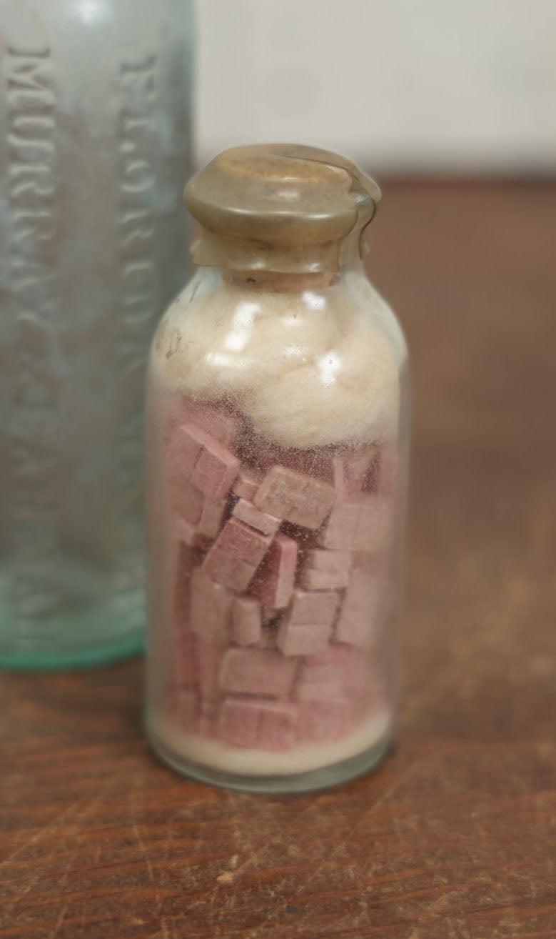 Lot 072 - Grouping Of Four Antique And Vintage Apothecary And Pharmacy Bottles - Florida Water, Upjohn Friable Pills, Daniels Veterinary Colic Cure, Roche's Hooping Cough