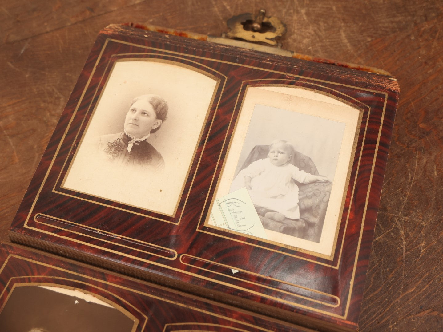 Lot 028 - Antique Family Photograph Album With Velvet Covering And Beveled Glass Heart Mirror, Containing 34 Cabinet Card Photos, 10 C.D.V.S, 1 Tintype, And 23 Paper Portrait Snapshots