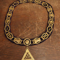Lot 052 - Antique Odd Fellows I.O.O.F. Purple Chain Collar With Many Symbols Including Three Links And Heart In Hand, With Crossed Swords Medallion, By Harding Uniform & Regalia Company, Boston