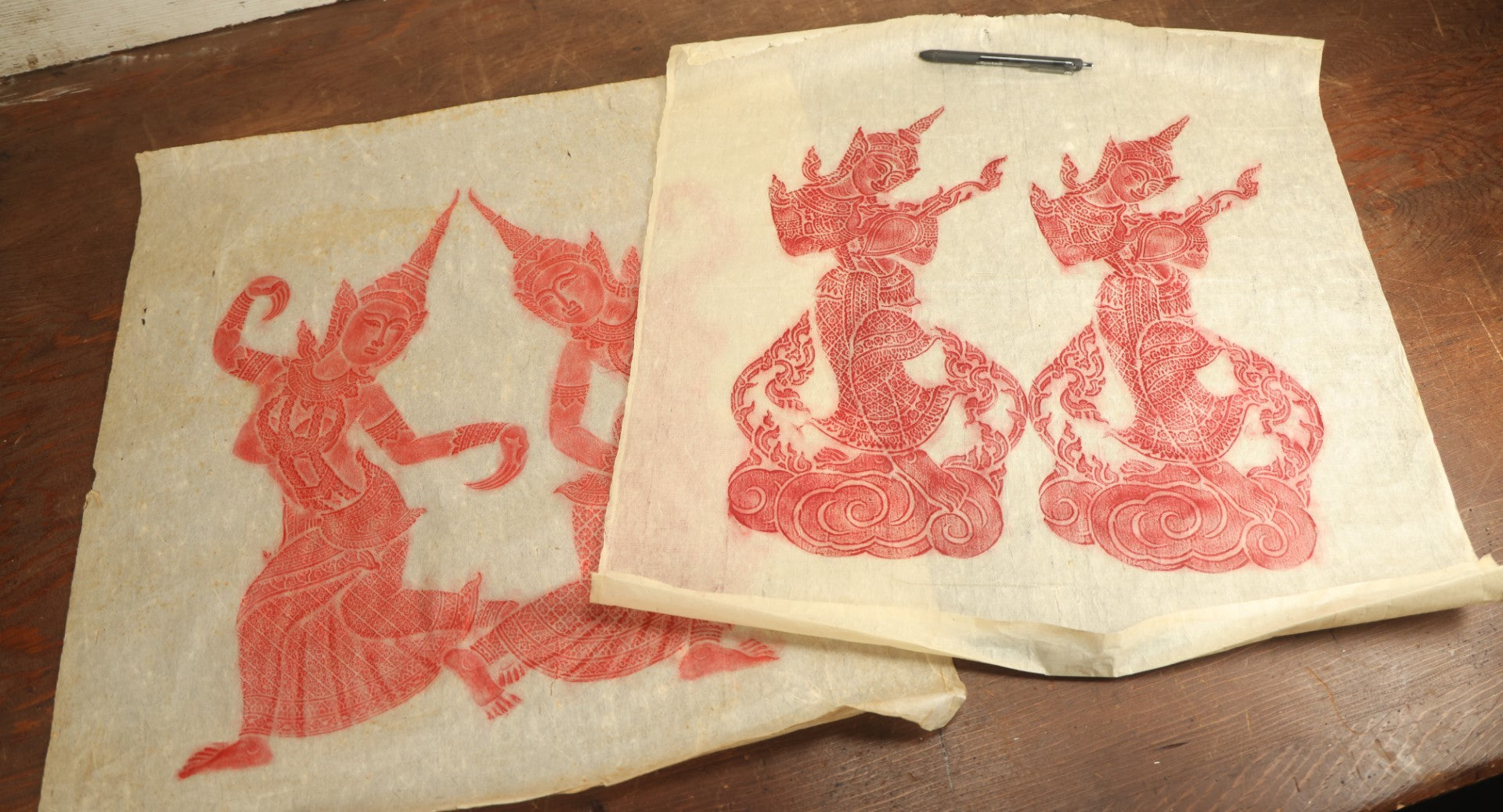 Lot 071 - Pair Of Vintage Thai Buddhist Temple Rubbings Of Dancers, Red On Rice Paper