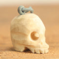 Lot 022 - Vintage Miniature Carved Bone Skull Charm With Hoop