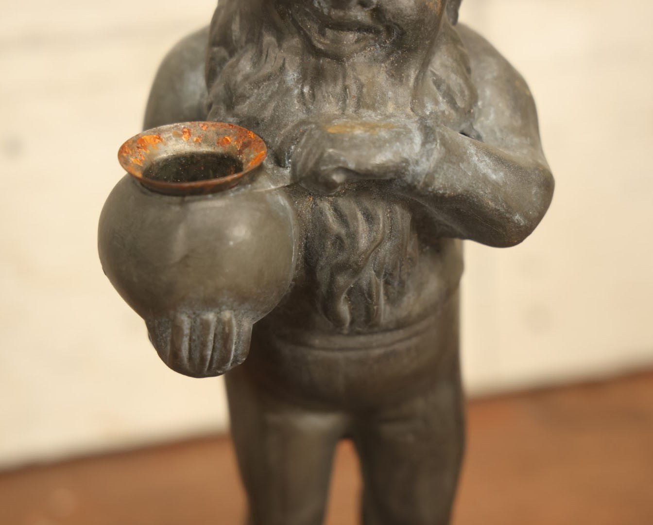 Lot 013 - Vintage Cast Metal Garden Gnome Holding Pot