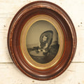 Lot 019 - Antique Full Plate Tintype Of A Young Boy Or Girl Sitting In A Chair, In A Deep Wood Oval Frame