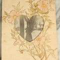 Lot 071 - Antique Hand Painted Paper Frame With Flowers And Leaves, With A Photo Of A Woman On A Street In The Winter, Circa Early 20th Century